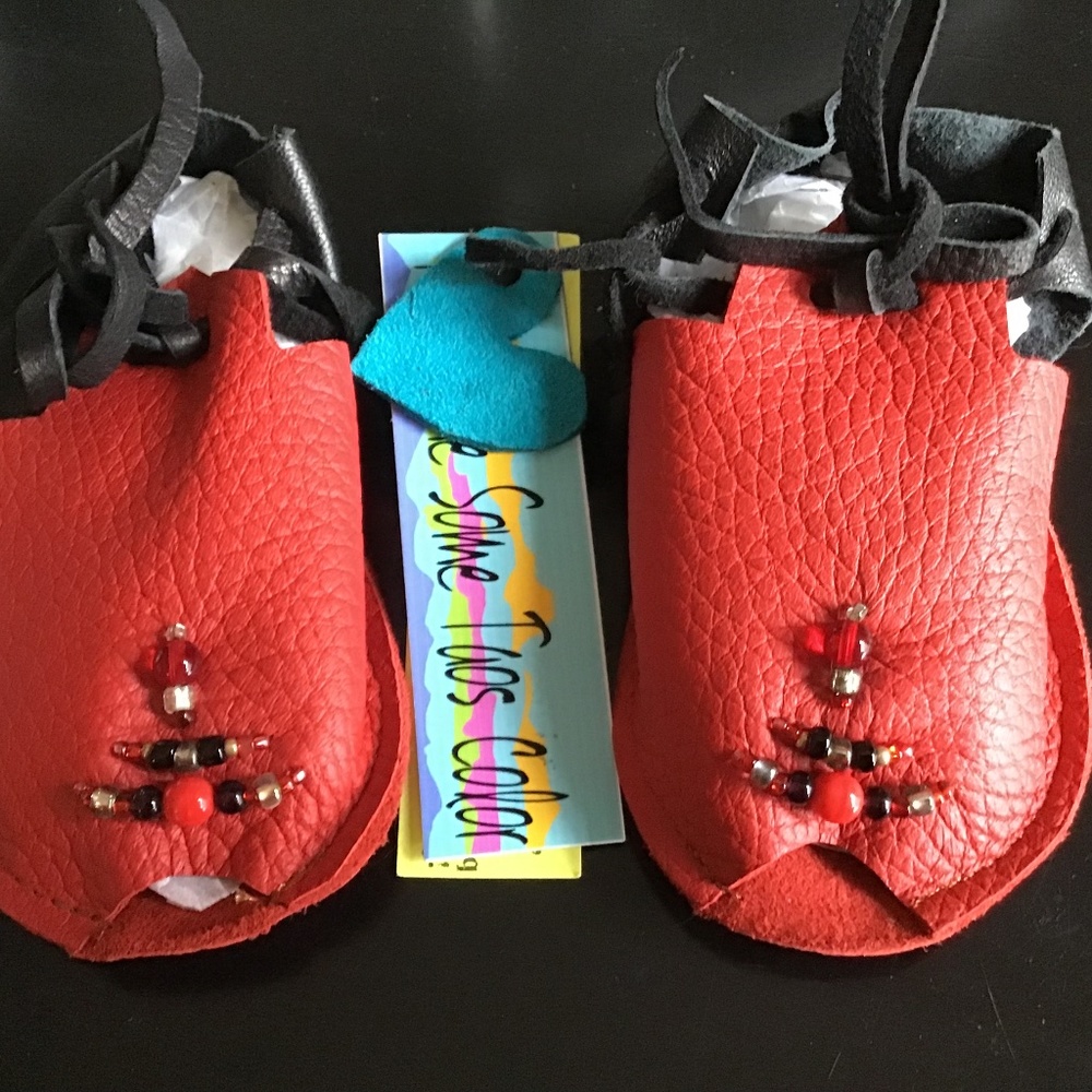 The sweetest TAOS baby Mocs..red and black..new with tags. Butter soft leather.